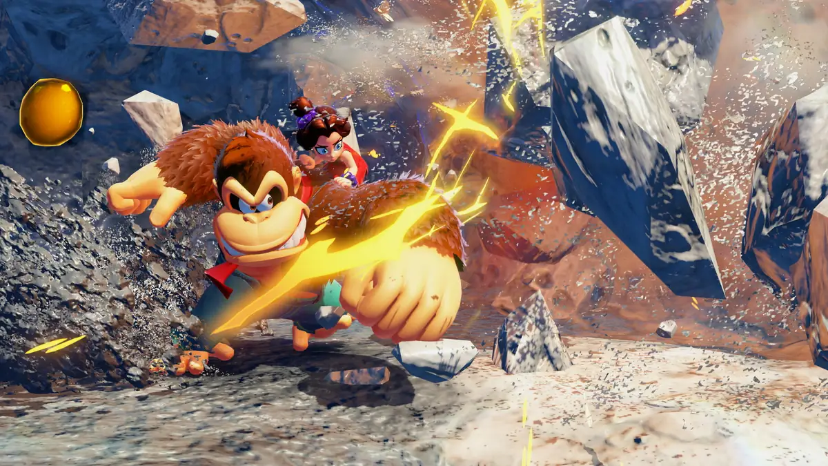 Donkey Kong slamming the ground in a canyon, with Pauline jumping behind him and debris in the air