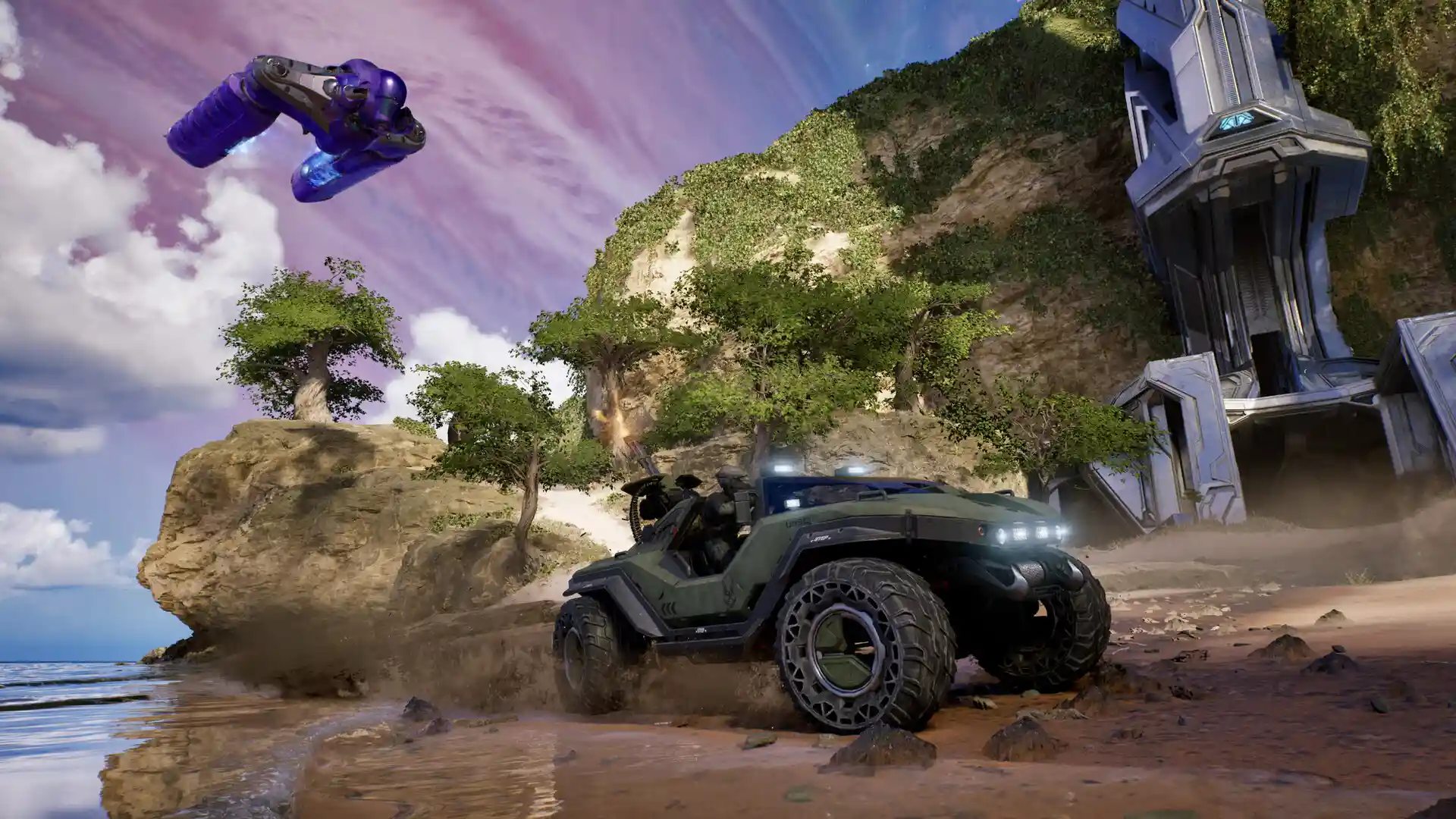 Warthog on a beach with a Covenant ship overhead