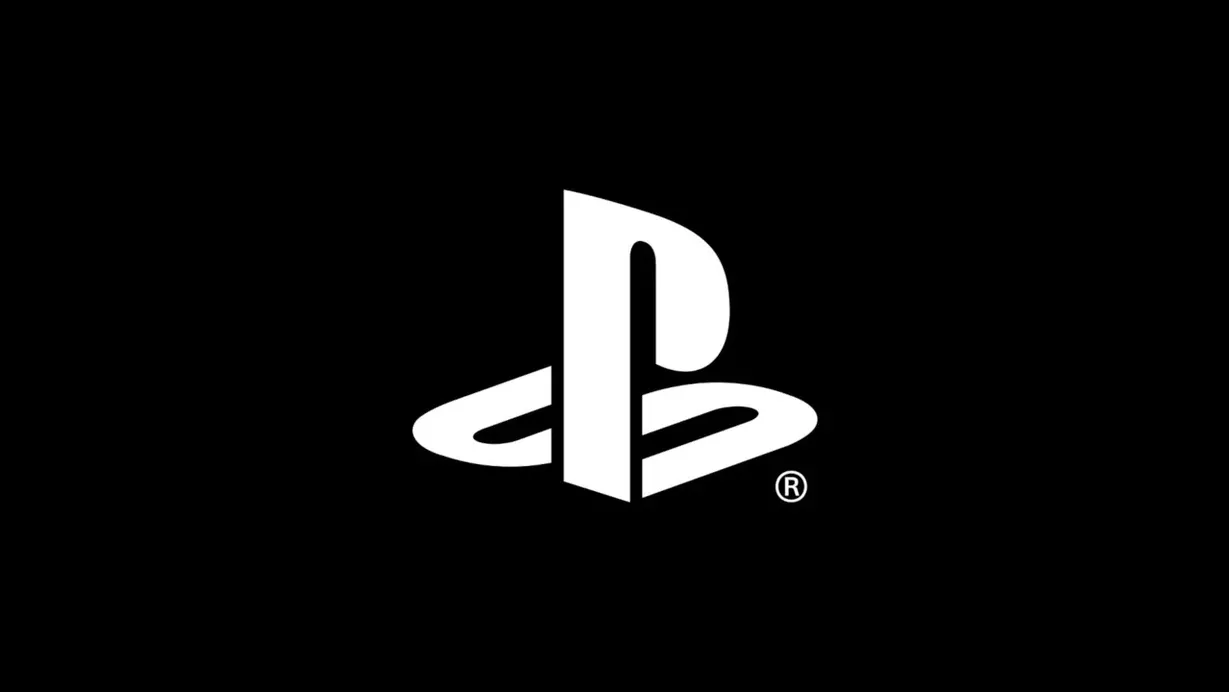 White PlayStation 5 with a white DualSense controller resting on top, light background
